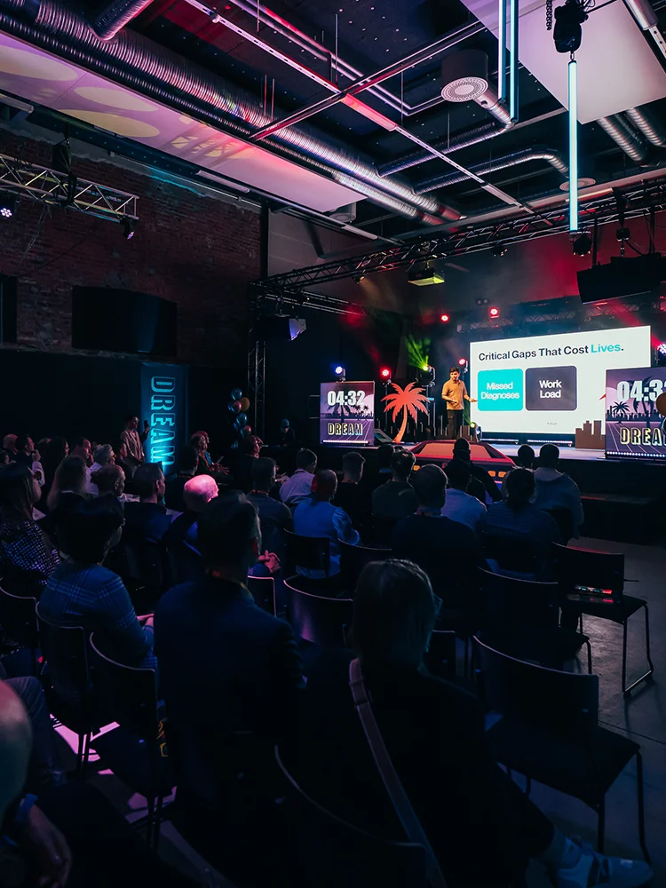 Dream 2025 event audience and a stage